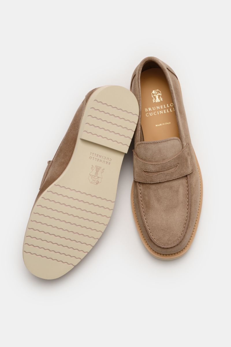 Brunello Cucinelli Penny Loafer taupe shown from top and sole views, crafted from smooth velour leather with a typical penny strap.