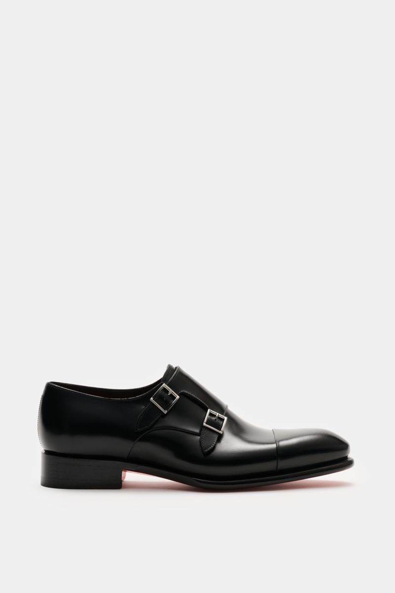Santoni Doppelmonk schwarz shown from the side in black calf leather with rounded toe, double silver buckles, leather lining, and rubber-reinforced heel.