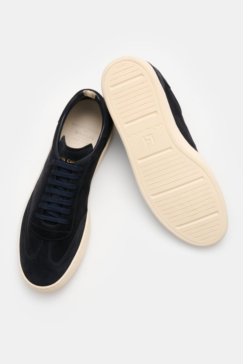 Top view of Officine Creative Sneakers 'Kafka' navy in premium suede with round toe, wing cap, embossed logo on tongue and heel, and lightweight sole.

Additional description: For anyone who appreciates comfort: The sneakers 'Kafka' in suede by OFFICINE C
