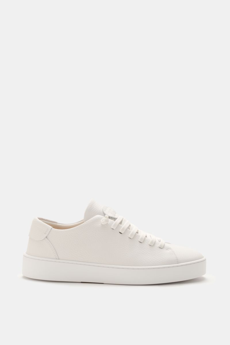 Side view of Fabiano Ricci Sneaker weiß in soft, grained white Nappa leather with round toe, elastic seven-eyelet lacing for slip-on effect, logo embossed tab, mesh lining, removable padded insole, and flexible white rubber sole.