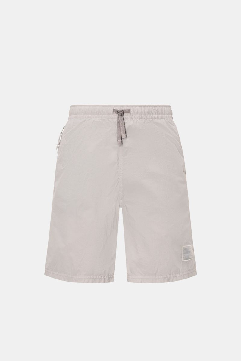 Stone Island Swim shorts 'Ghost Piece' grey shown from the front, monochrome design with elasticated waistband and drawstring.

A monochrome look in classic STONE ISLAND style: on the beach or at the pool, these swim shorts from the 'Ghost Collection' are