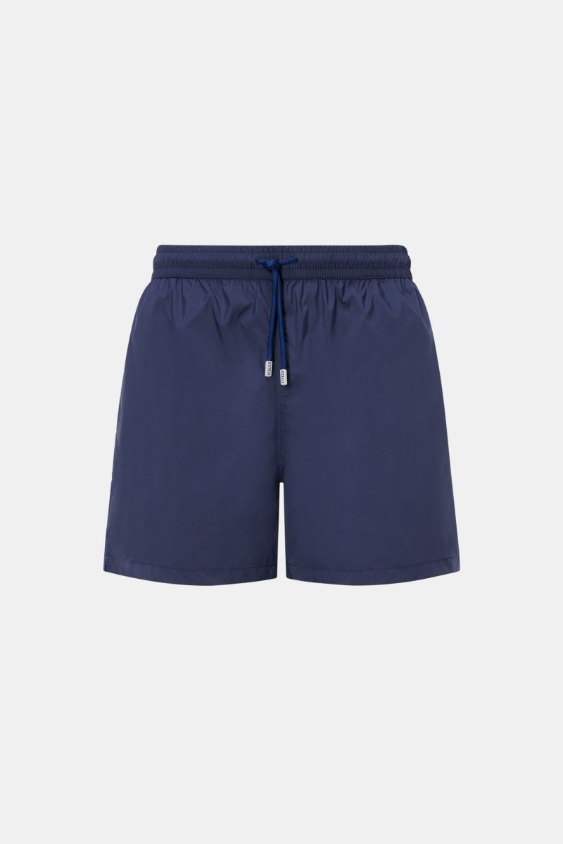 Front view of Fedeli Swim shorts 'Madeira Airstop' navy with elasticated waistband and drawstring, quick-drying microfiber, and regular fit. 

The swim shorts 'Madeira Airstop' by FEDELI are a timeless model for your suitcase. With their comfortable el