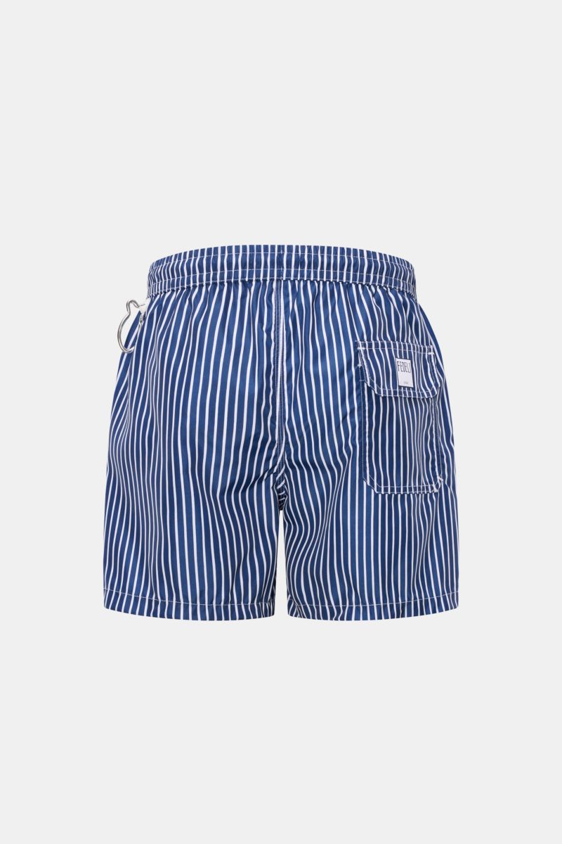 Rear view of Fedeli Swim shorts 'Madeira Airstop' navy/white striped with elastic waistband, side pockets, back pocket, whale-shaped carabiner.

Description: The quick-drying swim shorts 'Madeira Airstop' by FEDELI are a timeless and sustainable model 