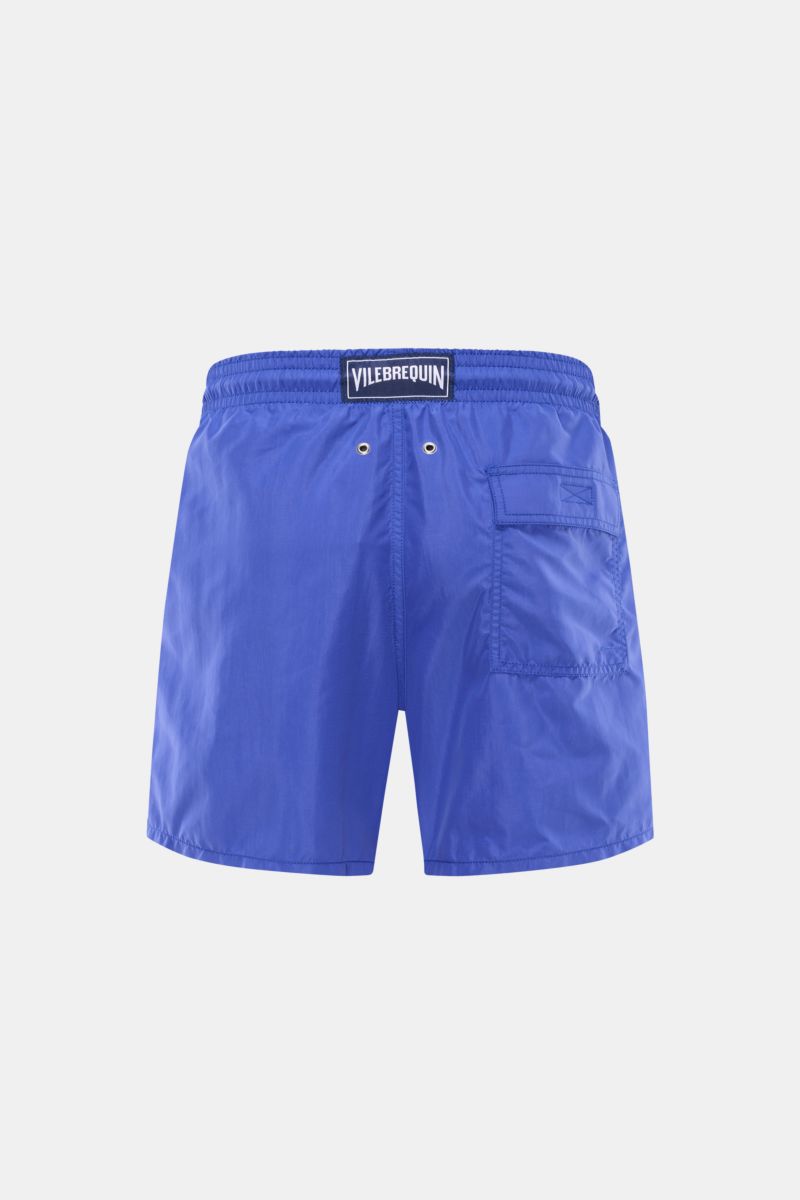 Rear view of Vilebrequin Swim shorts 'Moorea' blue with elasticated waistband, side pockets, back pocket with fastener, and drainage eyelets. Summer, sun, freedom: The 'Moorea' swim shorts by VILEBREQUIN are the perfect stylish companion for long days at 