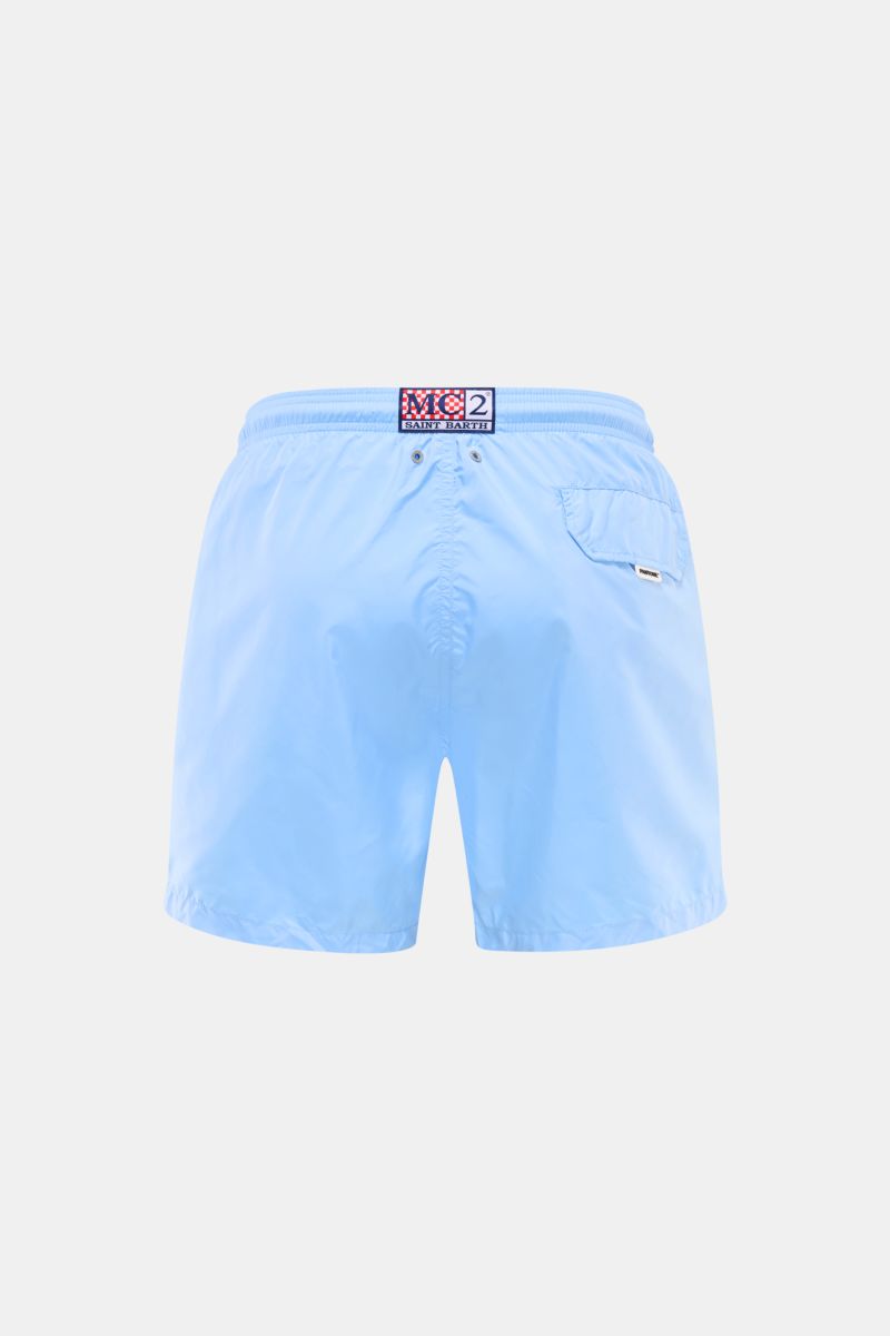 Back view of MC2 Saint Barth Swim shorts 'Lightning Pantone' light blue in recycled microfibre with elastic waistband, side pockets, and magnet back pocket.

Description: Immerse yourself in the refreshing collaboration between MC2 SAINT BARTH and PANT