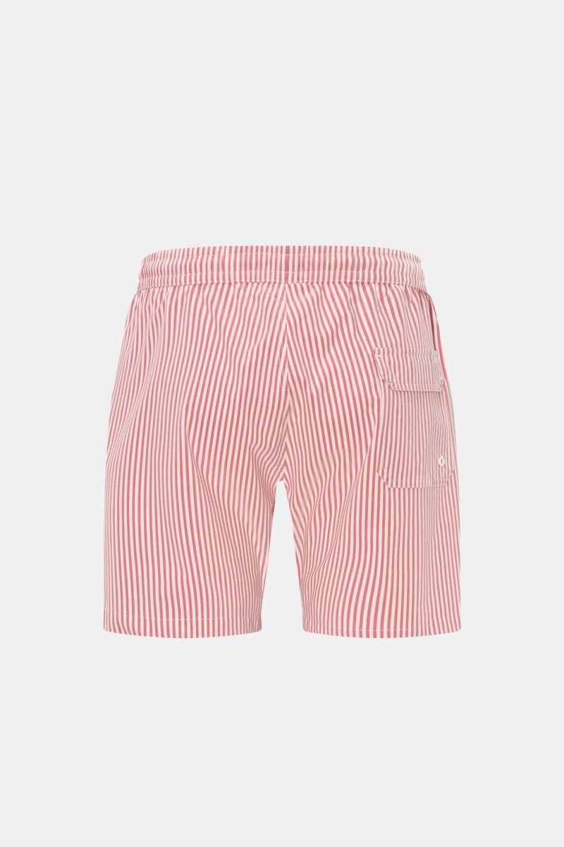 04651/ A trip in a bag Swim shorts rose/burgundy striped shown from the back with elastic waistband, side vents, and back pocket.

Perfect for your next summer holiday: With their modern striped pattern, these swim shorts by 04651/ A TRIP IN A BAG are an 