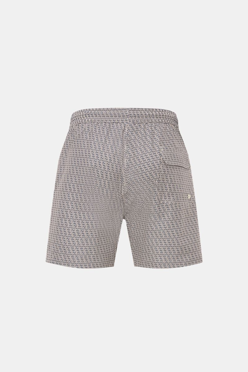 Rückansicht der 04651/ A trip in a bag Badeshorts 'Hansen' beige/navy gemustert mit elastischem Bund, seitlichen Taschen und Mesh-Innenfutter.