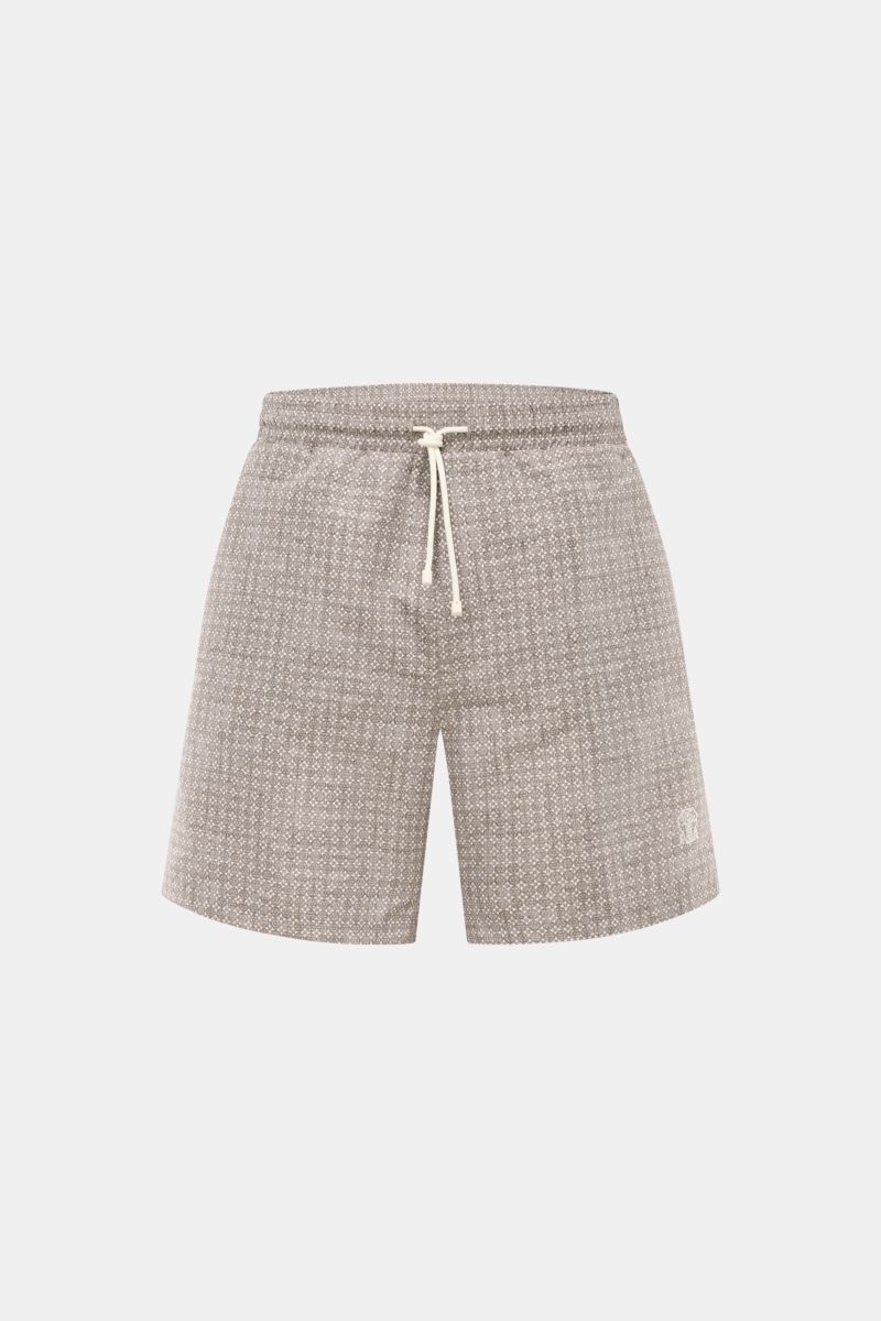 Front view of Brunello Cucinelli Badeshorts oliv/creme gemustert with floral pattern, elastic waistband, drawstring, and logo stitching. Luxuriös entspannen: Mit ihrem floralen Muster sowie dezenten Logo-Stitching werden die Badeshorts von BRUNELLO CUCINE