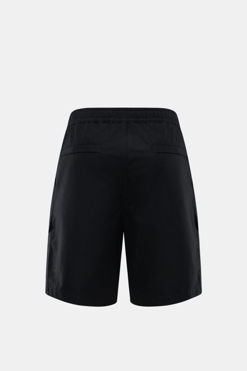 Rear view of Stone Island Shorts 'Ghost' black in pure cotton with elastic waistband, four front and jetted back pockets, and signature badge.

Description: Modern utility design: These STONE ISLAND shorts from the 'Ghost' Capsule Collection are timele