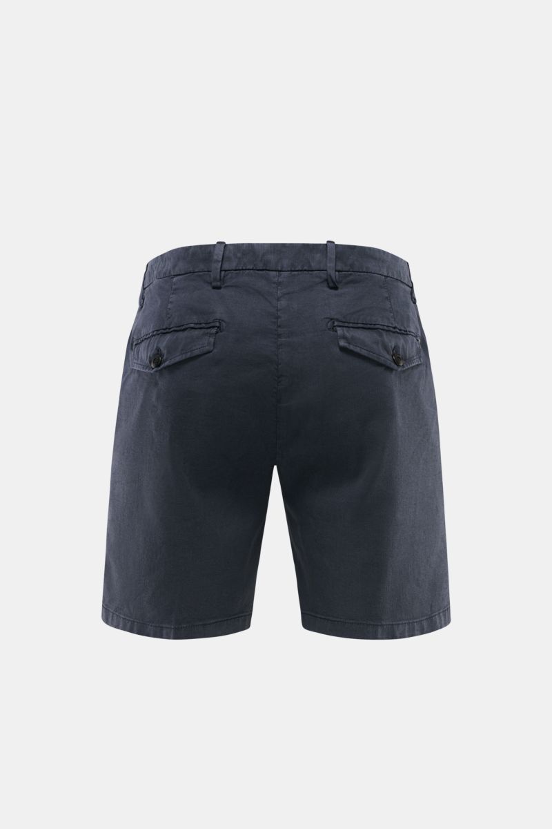 Rear view of Dondup Shorts 'Manheim' navy showing back pockets with flaps and buttons, belt loops, and regular fit.

Description: Enjoy carefree days in the warm weather – the 'Manheim' shorts by DONDUP are the perfect choice for summer outfits. Made f