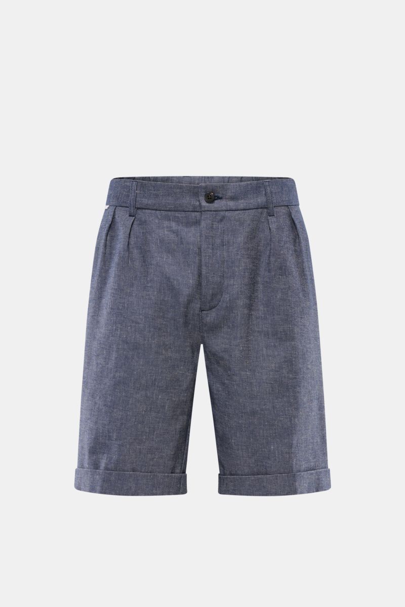 Front view of 04651/ A trip in a bag Shorts navy, classic linen and cotton shorts with double pleat, French pockets, elasticated waistband, and fixed hem turn-up.

Description: With this classic model, 04651/ A TRIP IN A BAG presents a comfortable pair