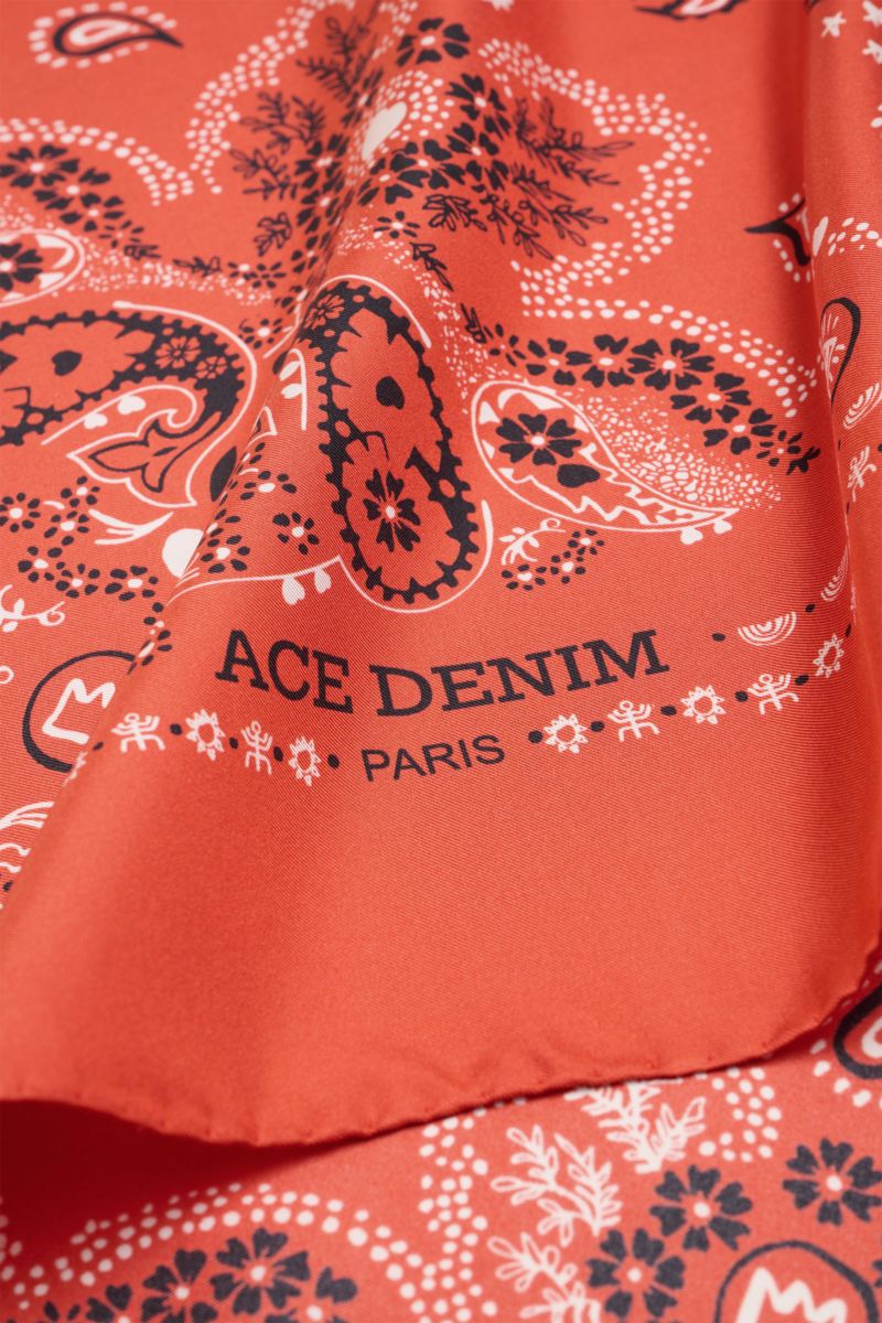 Close-up view of the Ace Denim Silk scarf red/black/white patterned, showcasing its paisley design and soft silk texture.

Description: 
Eye-catching for the warm season: The ACE DENIM silk scarf in a bandana design is a casual statement accessory for 