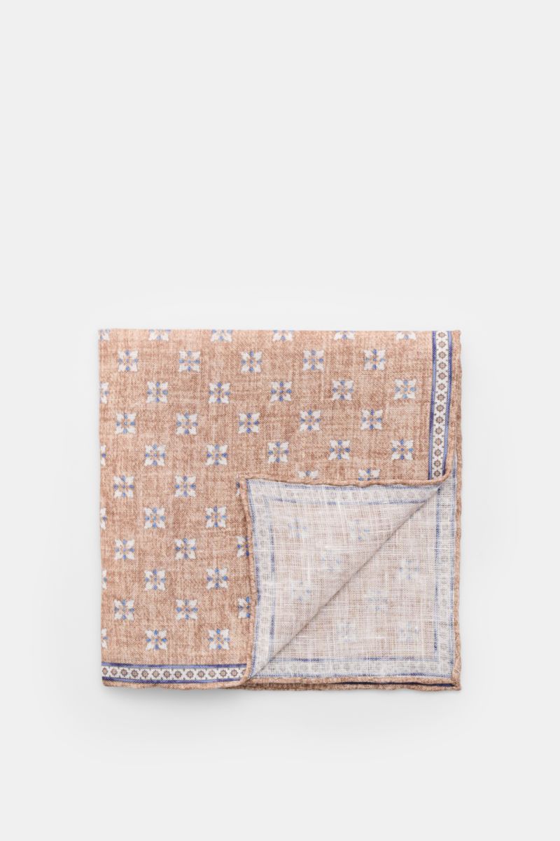 Rosi Collection Linen pocket square 'Fox' light brown/blue/off-white patterned, folded and photographed from above, pure linen, soft feel, floral print with edging, rolled edges, made in Italy, dimensions 31 cm x 31 cm.