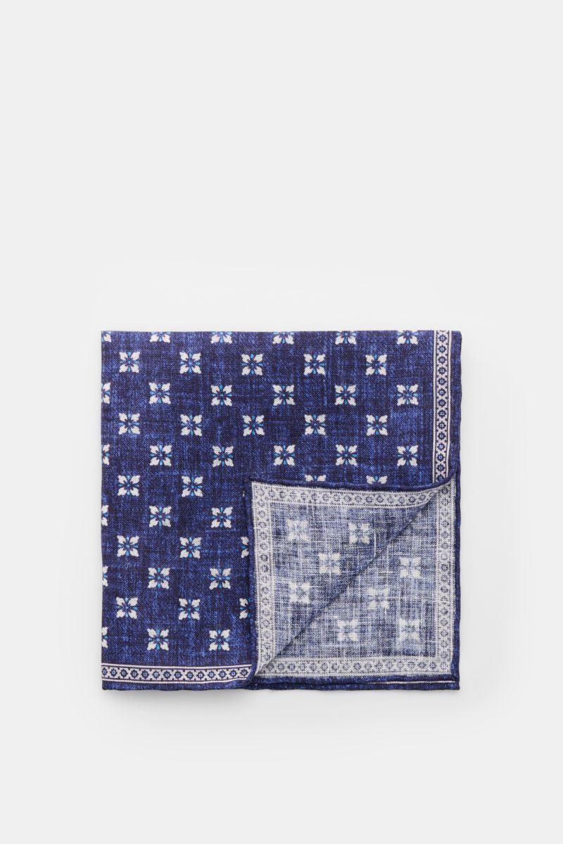 Rosi Collection Linen pocket square 'Fox' dark blue/light blue/white patterned, folded, top-down view, pure linen, soft feel, floral print with edging, rolled edges, made in Italy, 31 cm x 31 cm.