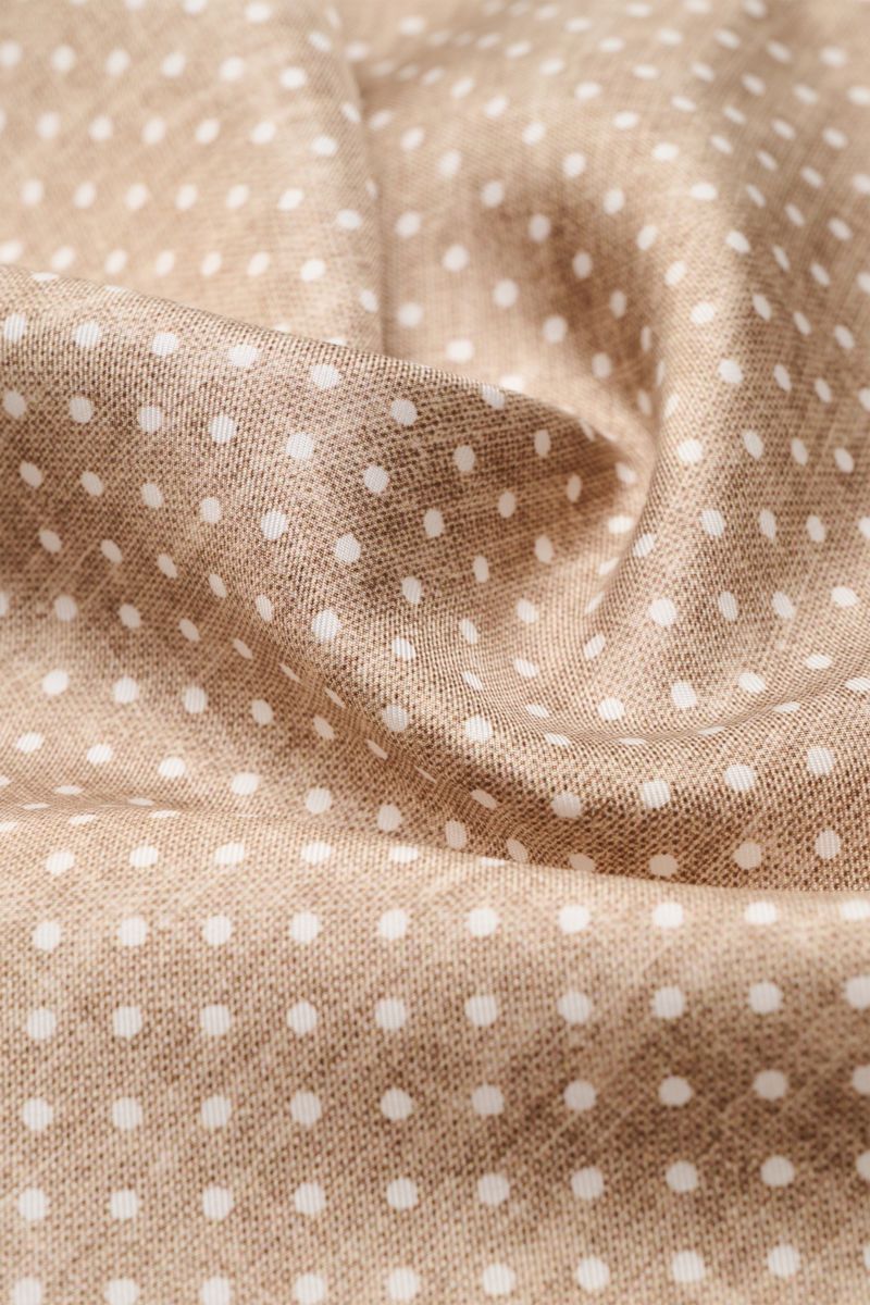 Rosi Collection Silk pocket square 'Silk' beige/white with polka dots shown close-up from above, pure silk, soft smooth touch, rolled edges, made in Italy, approx. 31 cm x 31 cm.