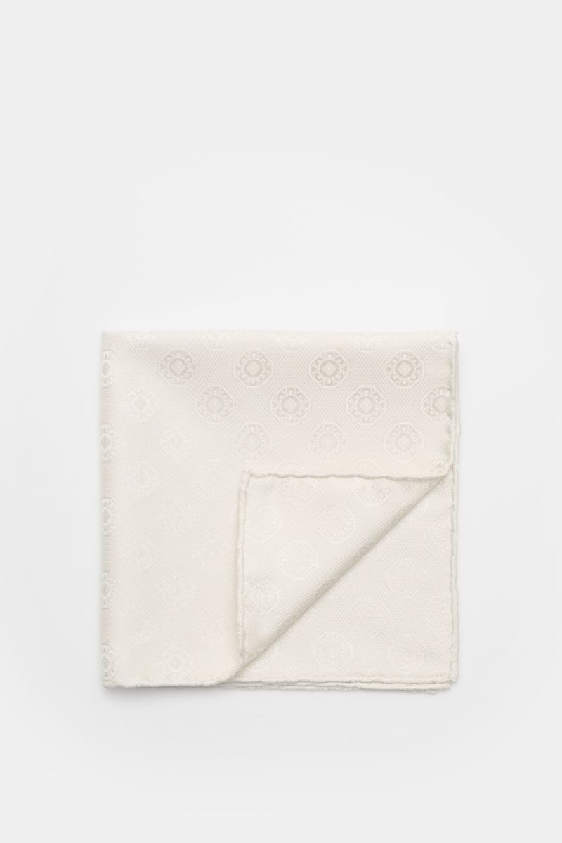 Alt tag (125 characters max):
Brunello Cucinelli Silk pocket square cream patterned with medallion weave, rolled edges, photographed from above on white background.

Additional description:
Elegant accent: This silk pocket square by BRUNELLO CUCINELLI 