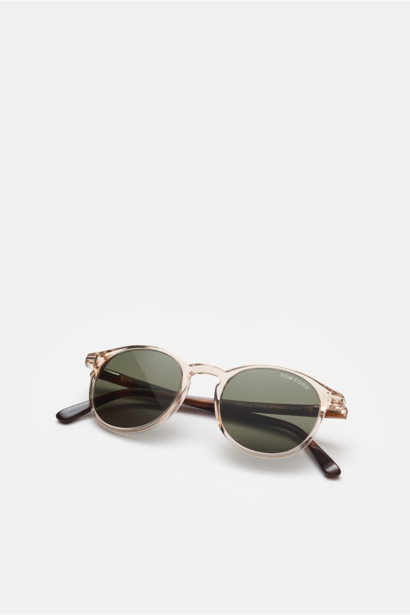 Front-angle view of Tom Ford Sonnenbrille 'Andrea' beige/braun gemustert/grün with round transparent acetate frame, tortoiseshell temples, and green plastic lenses offering 100% UV protection.