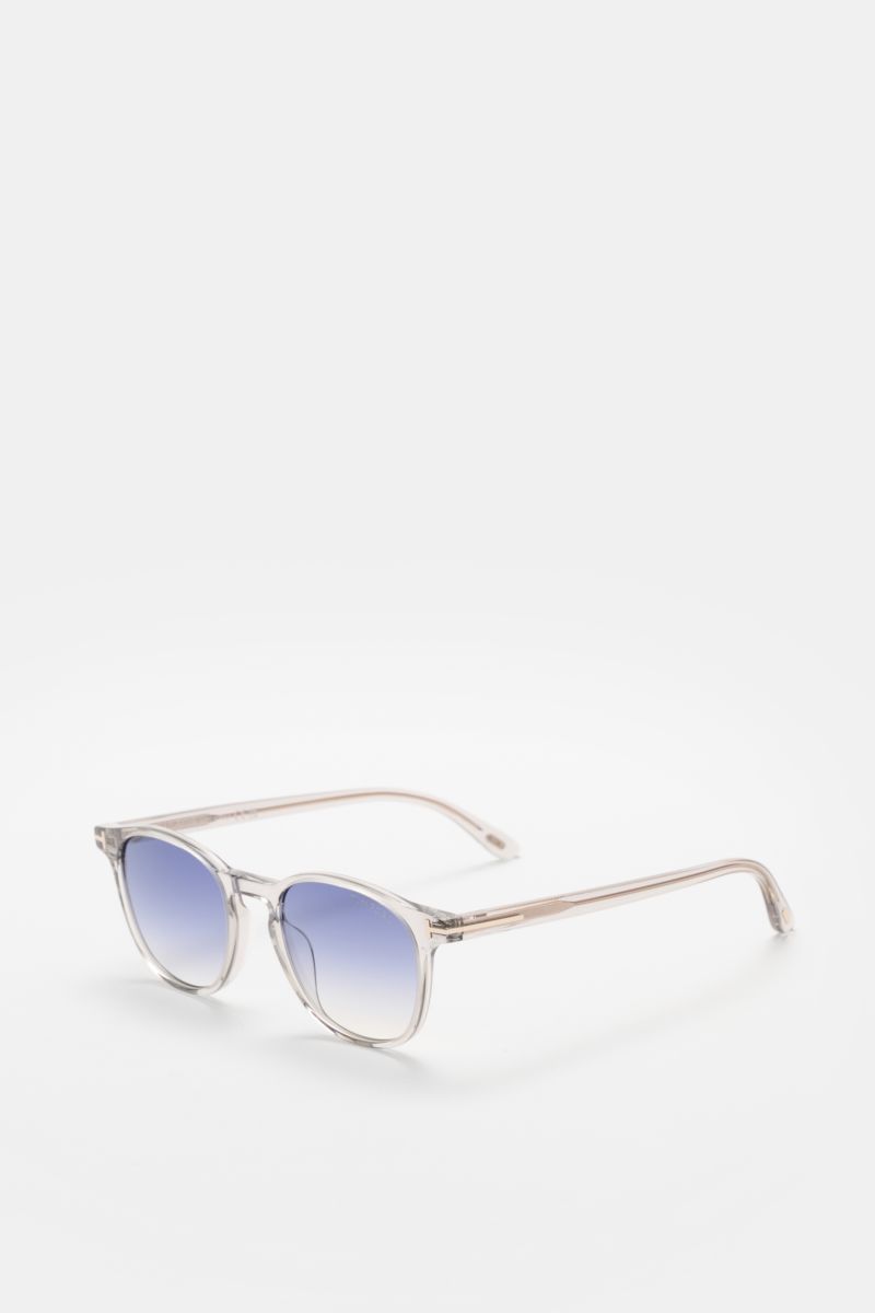 Tom Ford Sonnenbrille 'Holt' hellgrau, leicht gerundete Silhouette, melierter Acetat-Rahmen, Verlaufsgläser, seitliche Perspektive, UV-Schutz.