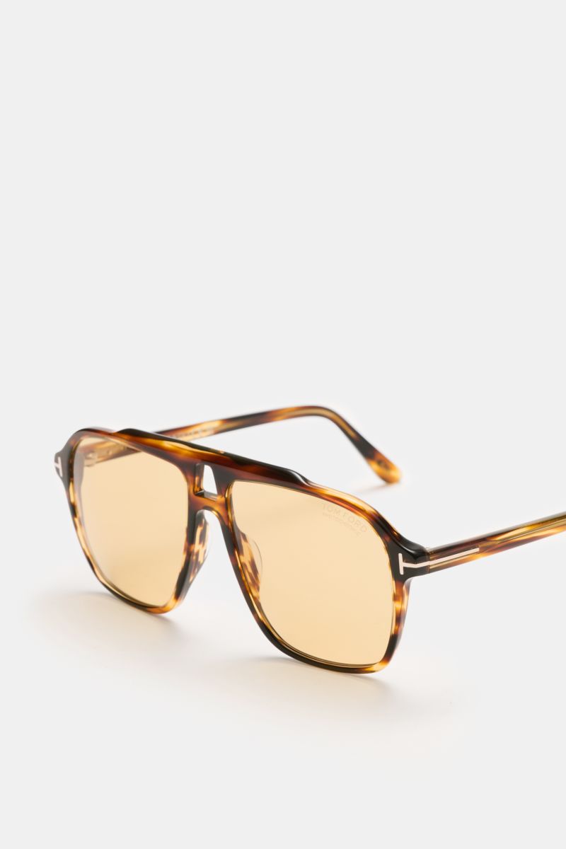 Tom Ford Sonnenbrille 'Autari' dunkelbraun meliert im klassischen Aviator-Stil mit photochromen Kunststoffgläsern, Acetat-Rahmen, 100% UV-Schutz, seitlich fotografiert.
