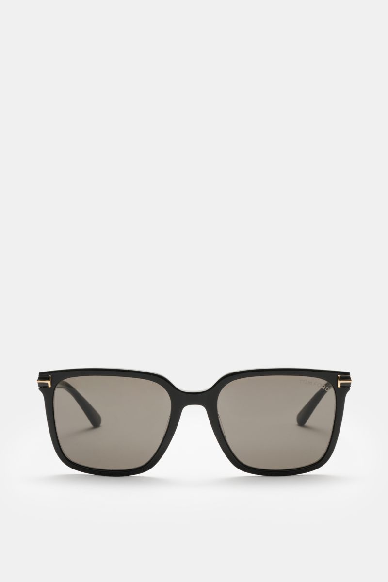 Front view of Tom Ford Sunglasses 'Jochem' black with slightly square shape, evenly tinted plastic lenses, and acetate frame. Stylish all-rounder: With their timeless design, these sunglasses by TOM FORD are an ideal summer essential. Slightly square shap