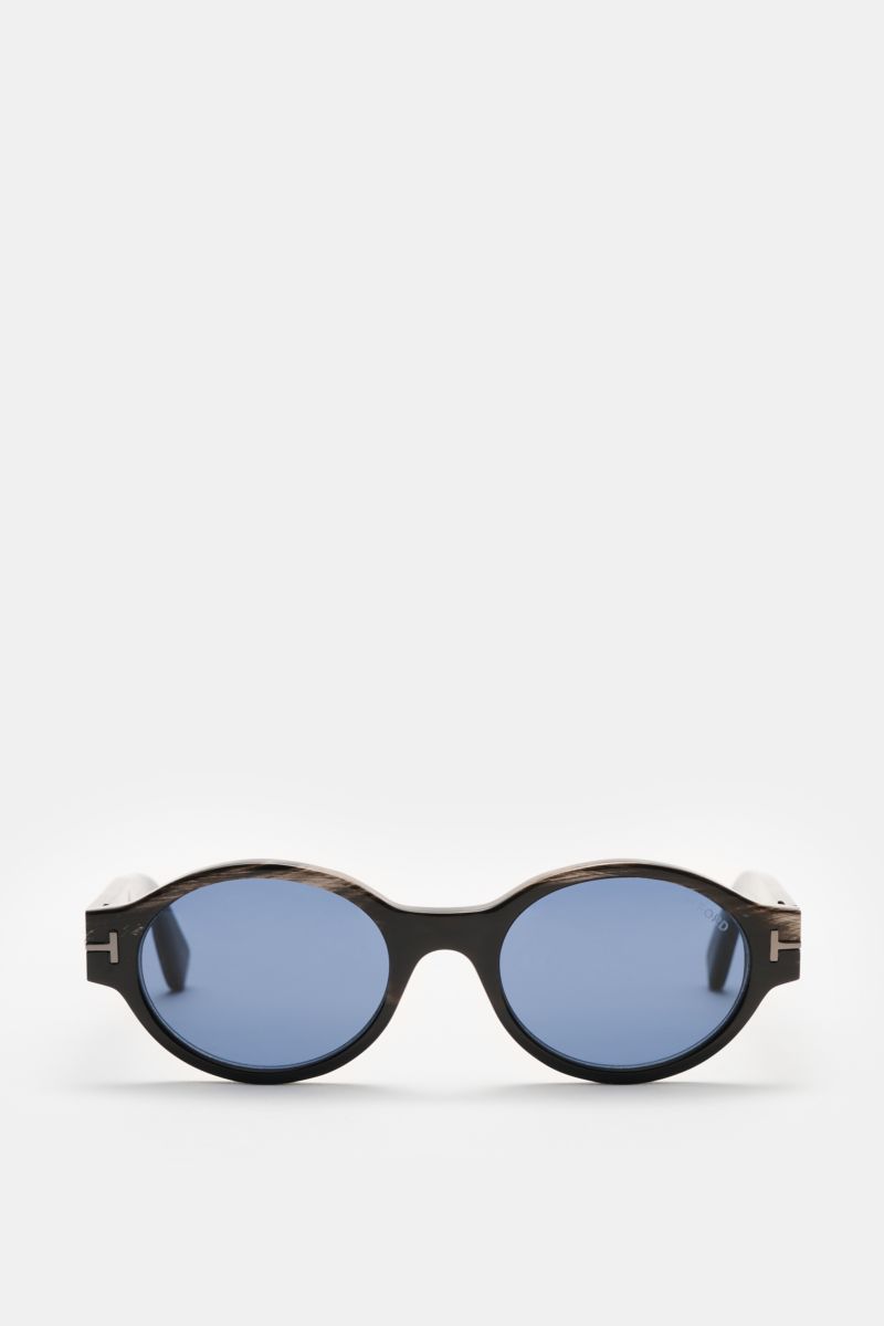 Front view of Tom Ford Horn sunglasses 'Private Collection' black/grey/white patterned with round blue lenses and signature ‘T’ detail.

The luxurious 'Private Collection' by TOM FORD only features exclusive designs worn by the designer himself. For ex