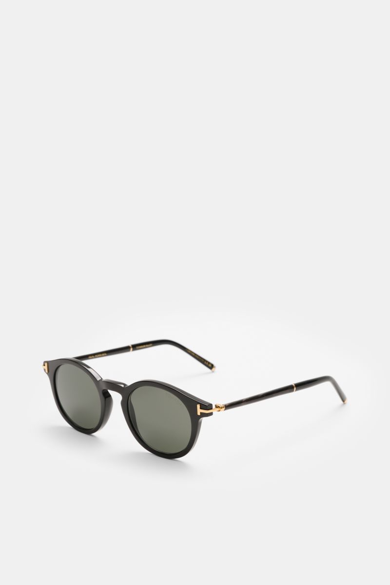 Tom Ford Horn sunglasses 'Private Collection' black/brown shown from a front-side angle featuring slightly rounded pantos design and titanium details.

Description: 
Stylish all-rounder: With their timeless pantos design and lenses by ZEISS, these luxu