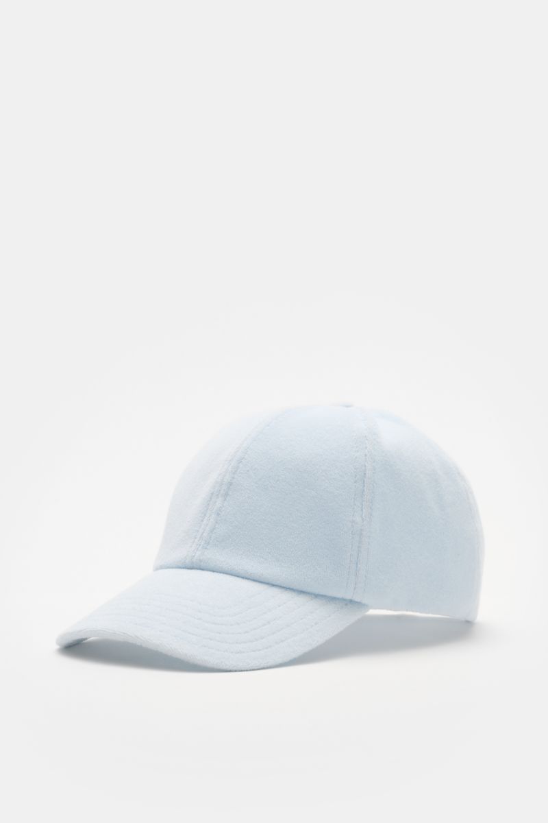 Front-side view of 04651/ A trip in a bag Terry baseball cap 'Terry' pastel blue in soft cotton terry with adjustable closure, six-panel style, and soft feel; spring awakening stylish baseball cap offering good protection, sporty or trendy preppy look.