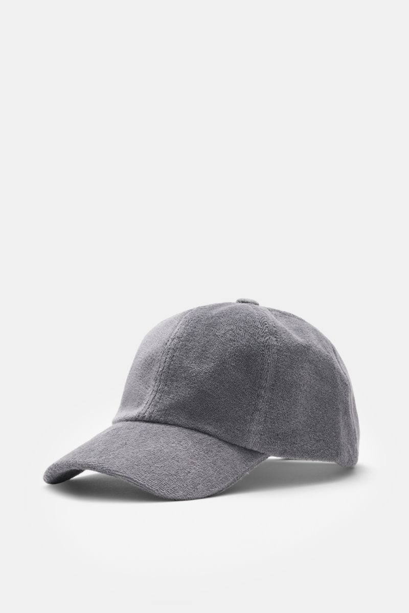 Front-side view of the 04651/ A trip in a bag Terry baseball cap 'Terry' grey in soft cotton terry, six-panel style with adjustable closure, offering a soft feel and versatile sporty or preppy look. Spring awakening: This stylish baseball cap in soft terr