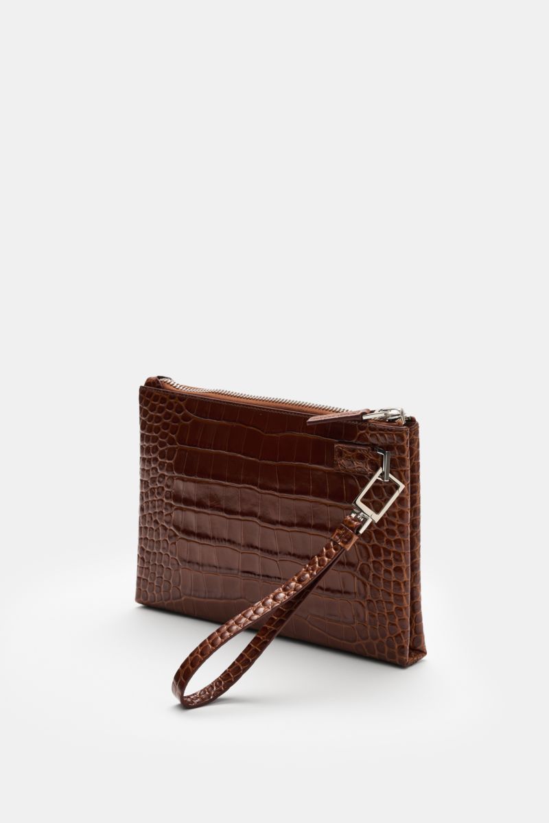 Side view of a Tom Ford Tasche braun in high-quality calf leather with reptile look, silver brass hardware, logo embossing, wrist strap, and zipper.