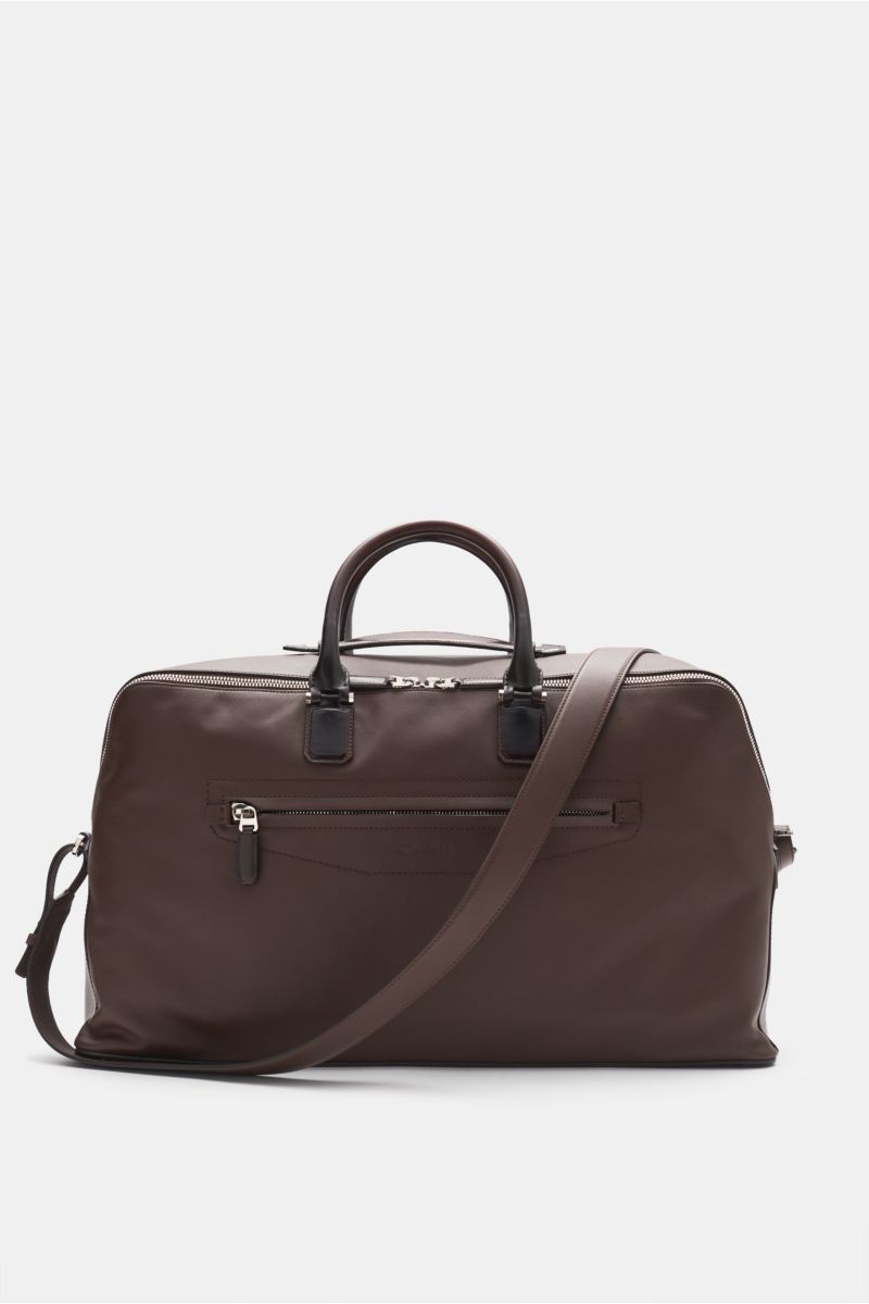 Front view of Santoni Weekender brown in soft, grained smooth leather with robust handles, silver hardware, detachable strap, and zipped compartments. Ready for your next short break or weekend getaway? This spacious SANTONI weekender made of soft, finely
