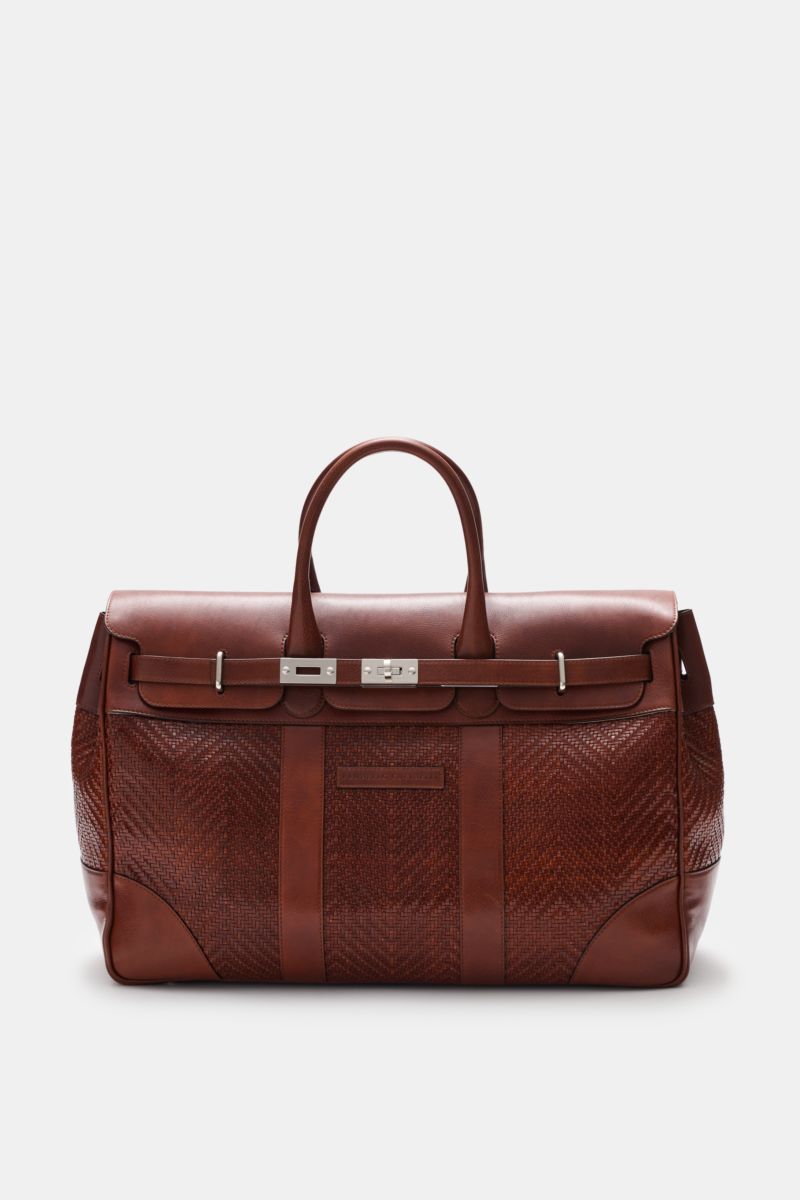 Brunello Cucinelli Weekender bordeaux seen from front, top handles, textured calf leather, gold hardware, adjustable leather buckle, spacious main compartment, zippered inner pocket, slip pocket, water-repellent textile lining, leather address tag, protec