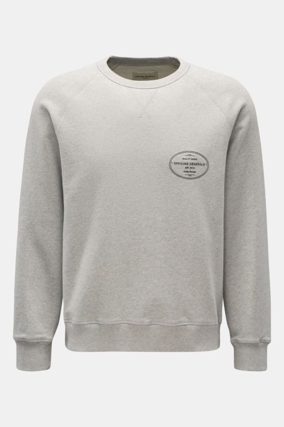 Frontale Aufnahme des Officine Générale Rundhals-Sweatshirt 'Didi' hellgrau meliert aus Bio-Baumwolle mit Raglanärmeln, Slim Fit, Logo-Print und Rippbündchen. Frontale Aufnahme des Officine Générale Rundhals-Sweatshirt 'Didi' hellgrau meliert aus Bio-Baumwolle mit Raglanärmeln, Slim Fit, Logo-Print und Rippbündchen.