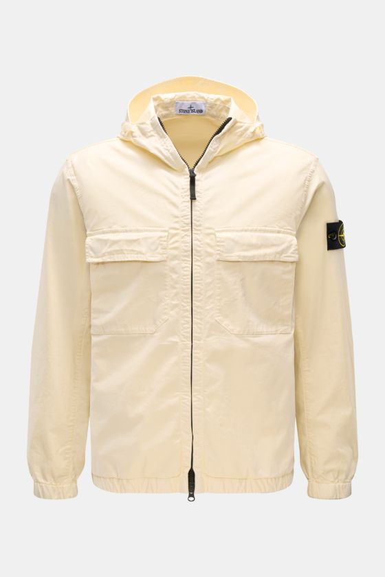 Stone Island Blouson 'Stretch Cotton Twill-TC' creme, frontale Nahaufnahme, Kapuze, elastische Baumwolle, Slim Fit, Brust- und Seitentaschen, Zwei-Wege-Reißverschluss, elastische Bündchen. Stone Island Blouson 'Stretch Cotton Twill-TC' creme, frontale Nahaufnahme, Kapuze, elastische Baumwolle, Slim Fit, Brust- und Seitentaschen, Zwei-Wege-Reißverschluss, elastische Bündchen.