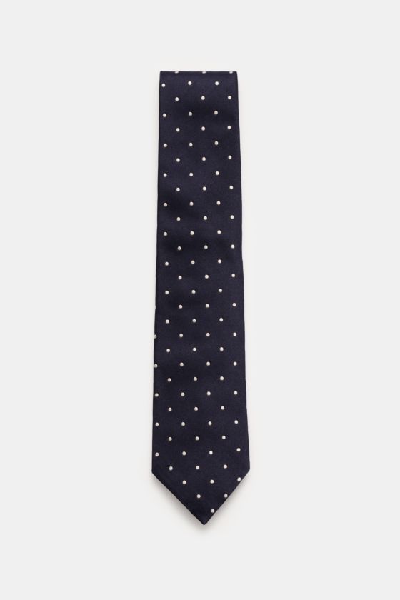 Tom Ford Seidenkrawatte navy/creme gepunktet, reine Seide, dezenter Glanz, monochromes Futter, Logo-Stitching, 8 cm breit, frontal fotografiert, made in Italy. Tom Ford Seidenkrawatte navy/creme gepunktet, reine Seide, dezenter Glanz, monochromes Futter, Logo-Stitching, 8 cm breit, frontal fotografiert, made in Italy.
