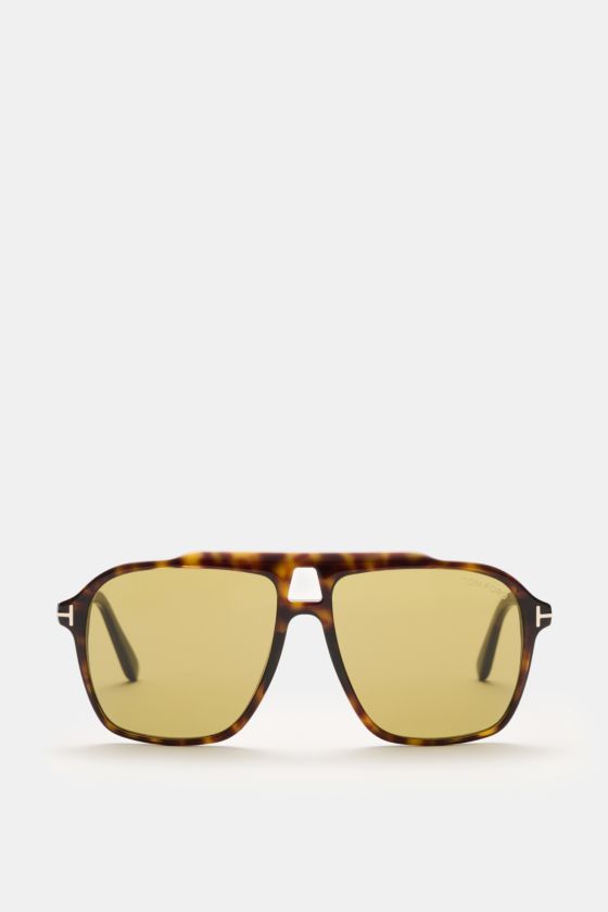Tom Ford Sonnenbrille 'Autari' dunkelbraun/hellbraun meliert im klassischen Aviator-Stil, frontale Ansicht mit getönten Kunststoffgläsern. Tom Ford Sonnenbrille 'Autari' dunkelbraun/hellbraun meliert im klassischen Aviator-Stil, frontale Ansicht mit getönten Kunststoffgläsern.