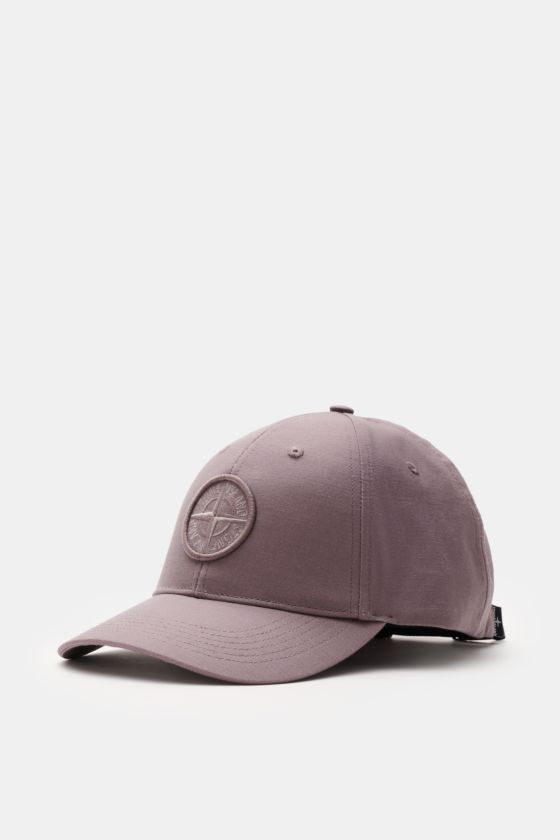 Stone Island Baseball-Cap violett aus reiner Baumwolle mit gebogenem Schirm, tonal gesticktem Kompass-Logo, verstellbarem Verschluss, seitliche Perspektive. Stone Island Baseball-Cap violett aus reiner Baumwolle mit gebogenem Schirm, tonal gesticktem Kompass-Logo, verstellbarem Verschluss, seitliche Perspektive.
