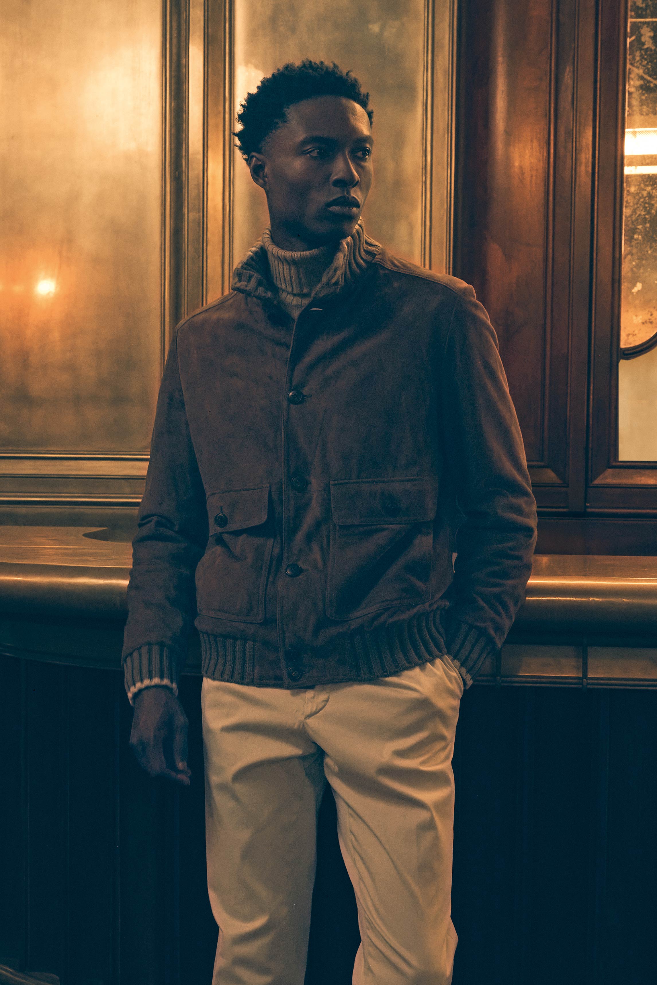 Shop by Look 20 Edition Vol. 19 shows a front view of a model wearing a grey-brown velour leather blouson 'Verbier' from Fedeli, beige mottled cashmere turtleneck jumper from Filippo de Laurentiis, and cream-colored chino pants 'Herrick' from GTA, combini