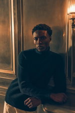 Shop by Look 22 Edition Vol. 19, model photographed from the front wearing a navy cashmere FTC turtleneck with ribbed collar, cuffs, hem, paired with white PT Torino 'The Rebel' pants, elegant and sophisticated blend of luxurious materials and classic col