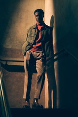 Shop by Look 28 Edition Vol. 19 shows a model from low front wearing a dark green velour leather 'Mex' jacket by Arma, rust brown turtleneck by Filippo de Laurentiis, taupe 'Chiaia' chinos from Berwich, and brown 'Dude Flexi' Chelsea boots from Officine C
