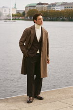 Shop by Look 04 Denis Cebulec in Lardini for BRAUN Hamburg, front view of model wearing brown/beige patterned coat, brown blazer, cream turtleneck, beige trousers, brown boots, by Lardini, Aida Barni, PT Torino, Officine Creative, stylish for cool day.